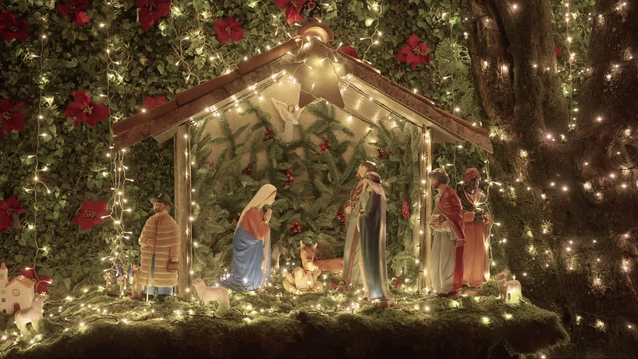 beautifully decorated nativity scene with glowing fairy lights, featuring Mary, Joseph, baby Jesus, and the Wise Men