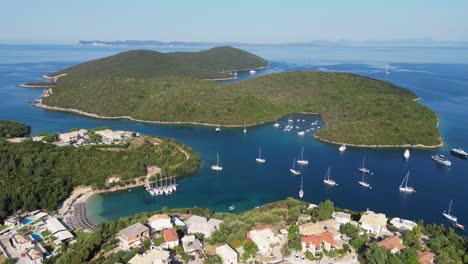 syvota coastal village, boats and islands in ionian sea, epirus, greece mainland - aerial