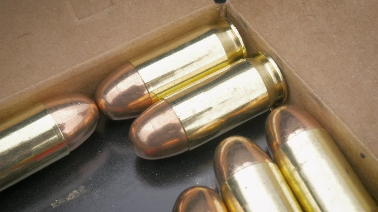 Closeup of 9mm Bullets in an Ammo Box in 4k