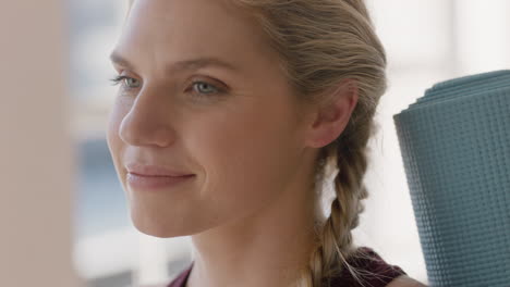 portrait beautiful caucasian woman yoga instructor smiling enjoying practicing lifestyle meditation classes in workout studio