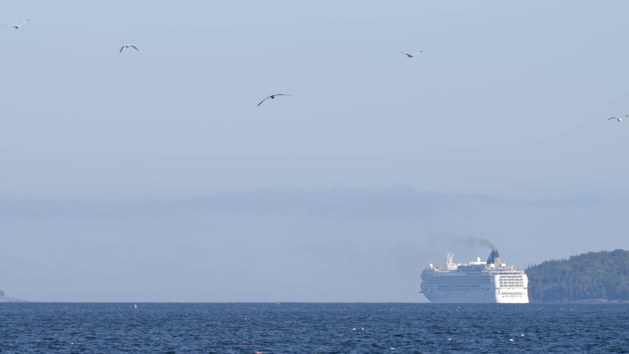Large Cruise Liner on the Horizon of the Atlantic Ocean in Summer