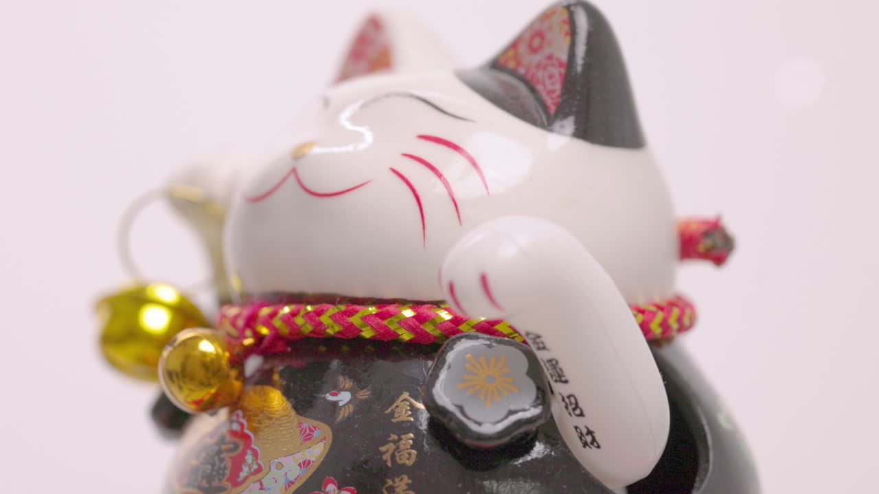 el gato de la suerte manejo agita