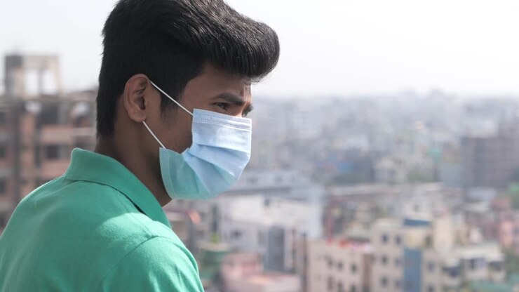 Man Wearing Mask in Cityscape