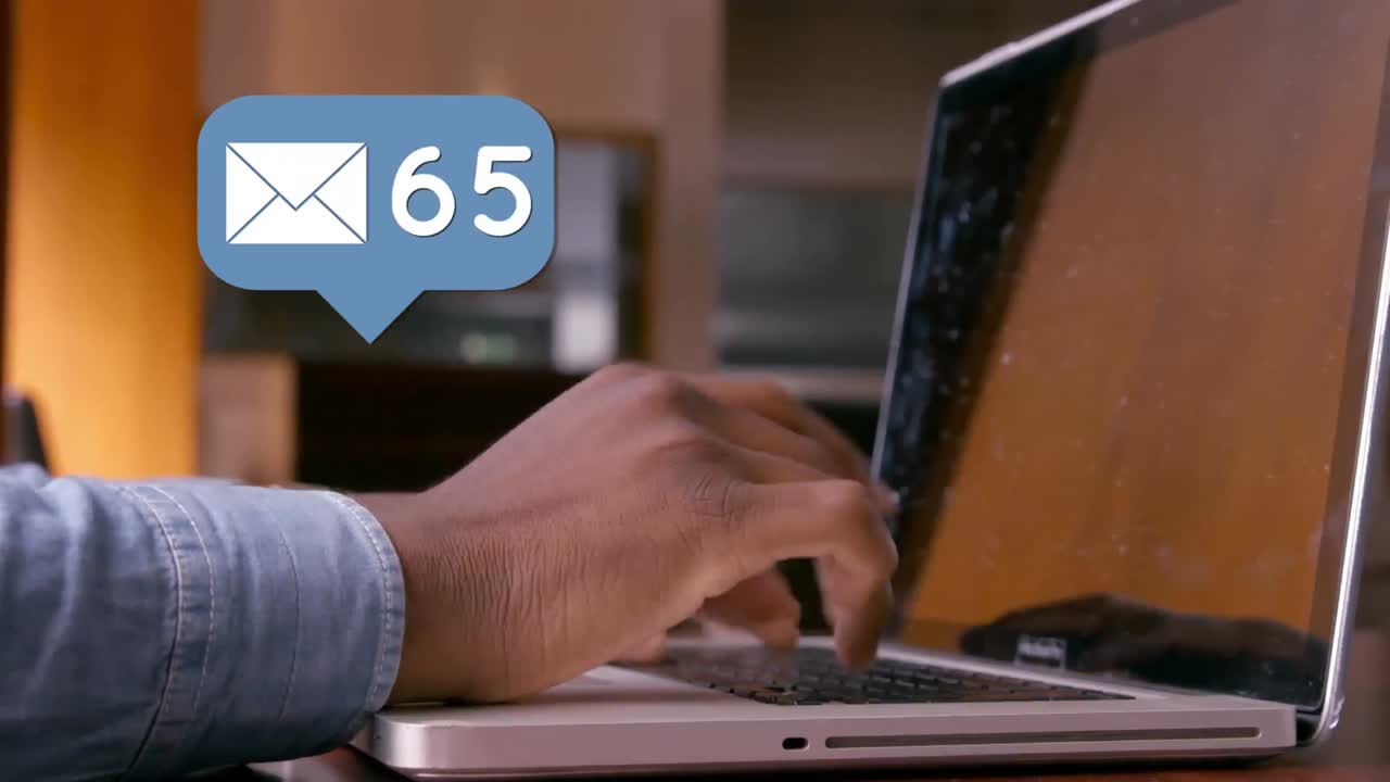 Checking emails on a laptop