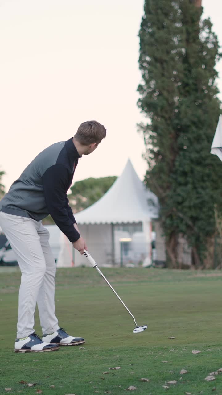 Golfer Putting on the Green