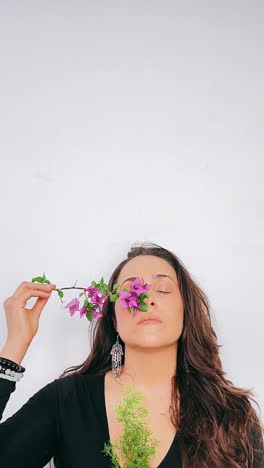 woman relaxing with flowers