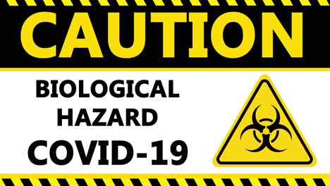 big flashing caution sign over biohazard covid-19 logo on white background