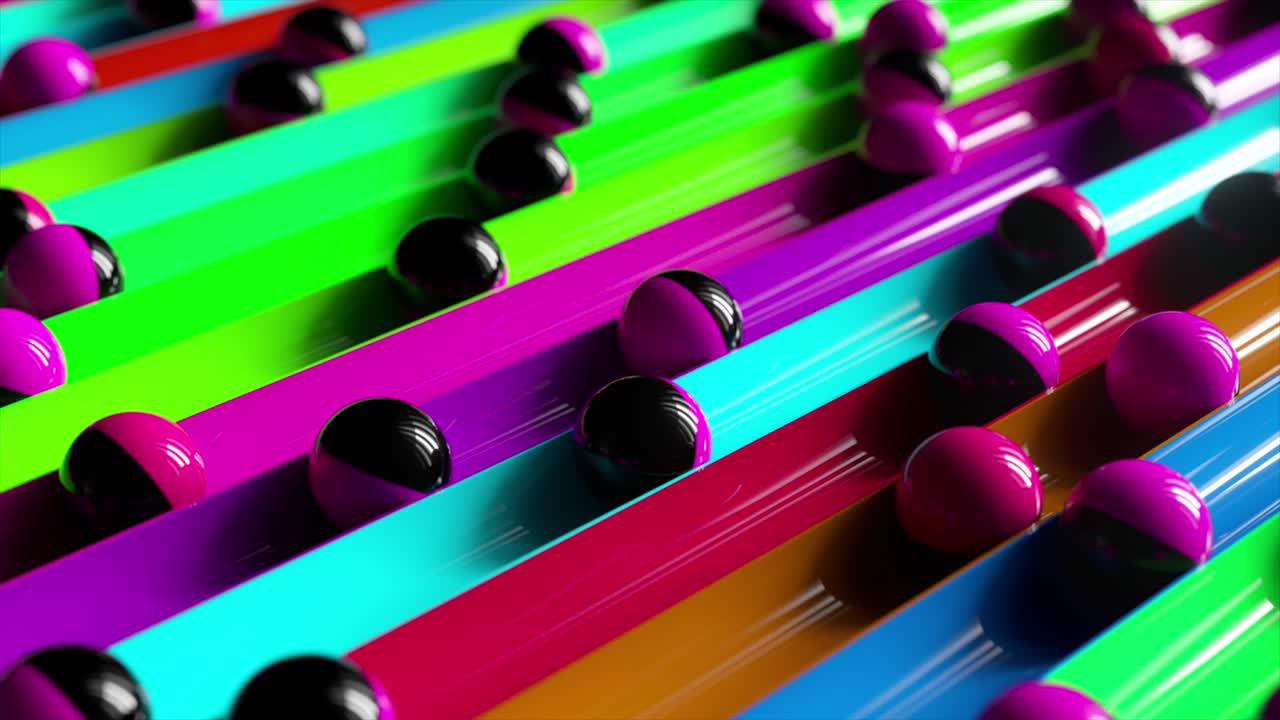 bolas coloridas moviéndose a través de tubos