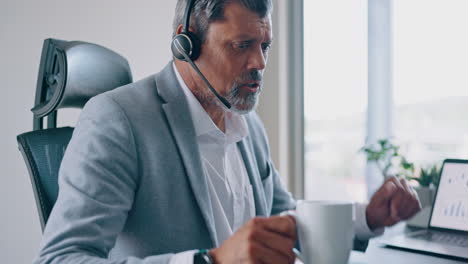 Call-center,-man-and-coffee-with-focus