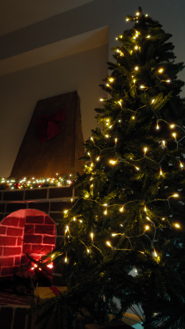 Christmas Tree Lights Blink Cheerfully Next to a Fake Fireplace