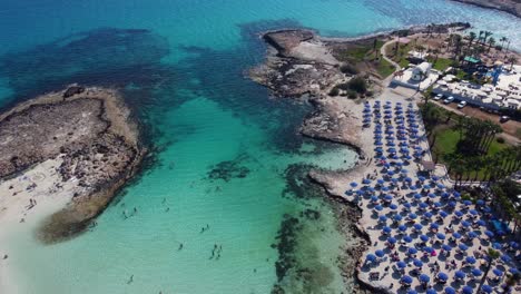 aerial view over latchi adams beach with turquoise waters in ayia napa, cyprus