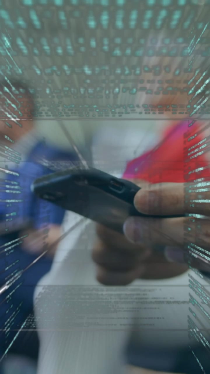 Animation of data processing over businessman using smartphone