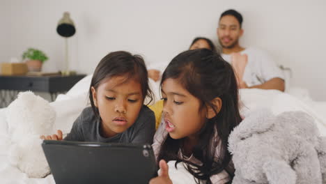 Little-girls-learning-and-browsing-on-a-digital