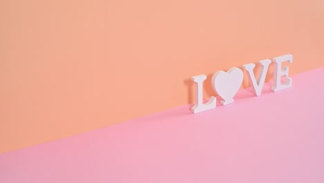 love letters appear on orange pink theme and heart jump in the middle of letters instead of o letter. stop motion