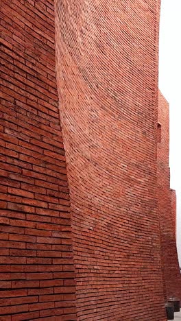 curved red brick wall