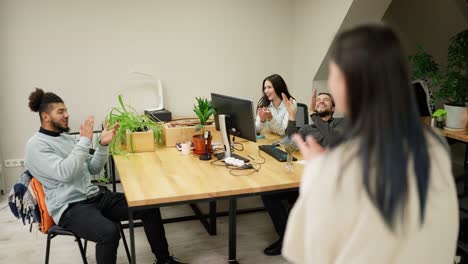 happy pleased girl get team applause after financial report presentation at group meeting