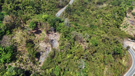 road, jungle and mountain in songklaburi, thailand