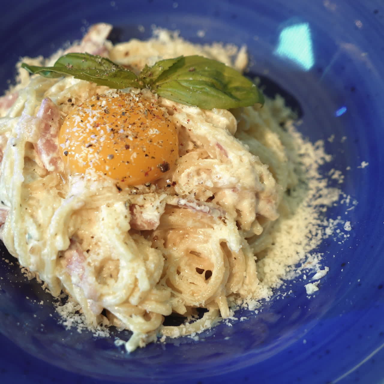 Pasta Carbonara with parmesan and yolk. Italian Cuisine. Sqare video