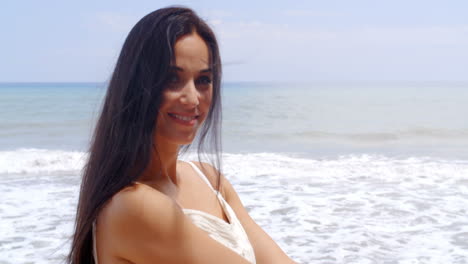 Hispanic-Young-Lady-in-White-Enjoying-at-the-Beach