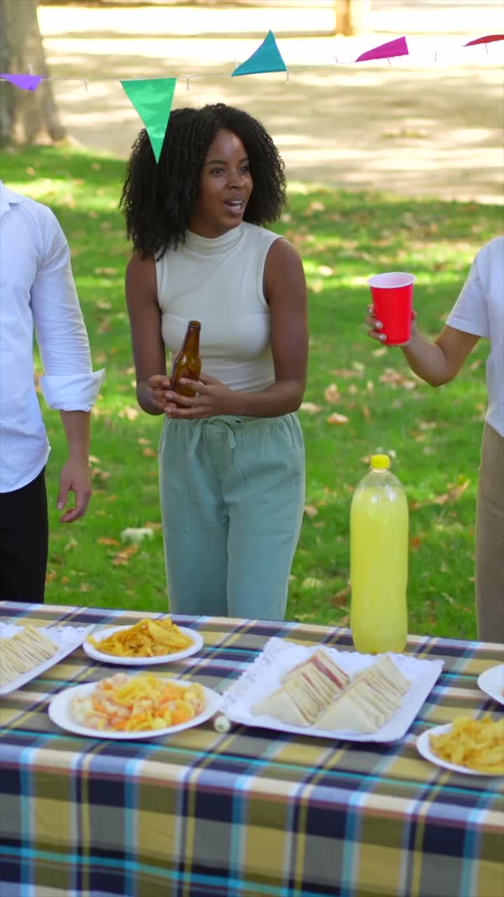 Friends Celebrating at an Outdoor Picnic