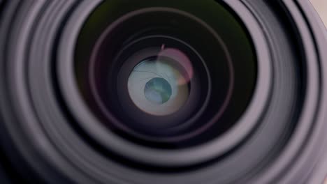 mirrorless camera lens f-stop aperture ring adjustments, macro close-up detail view