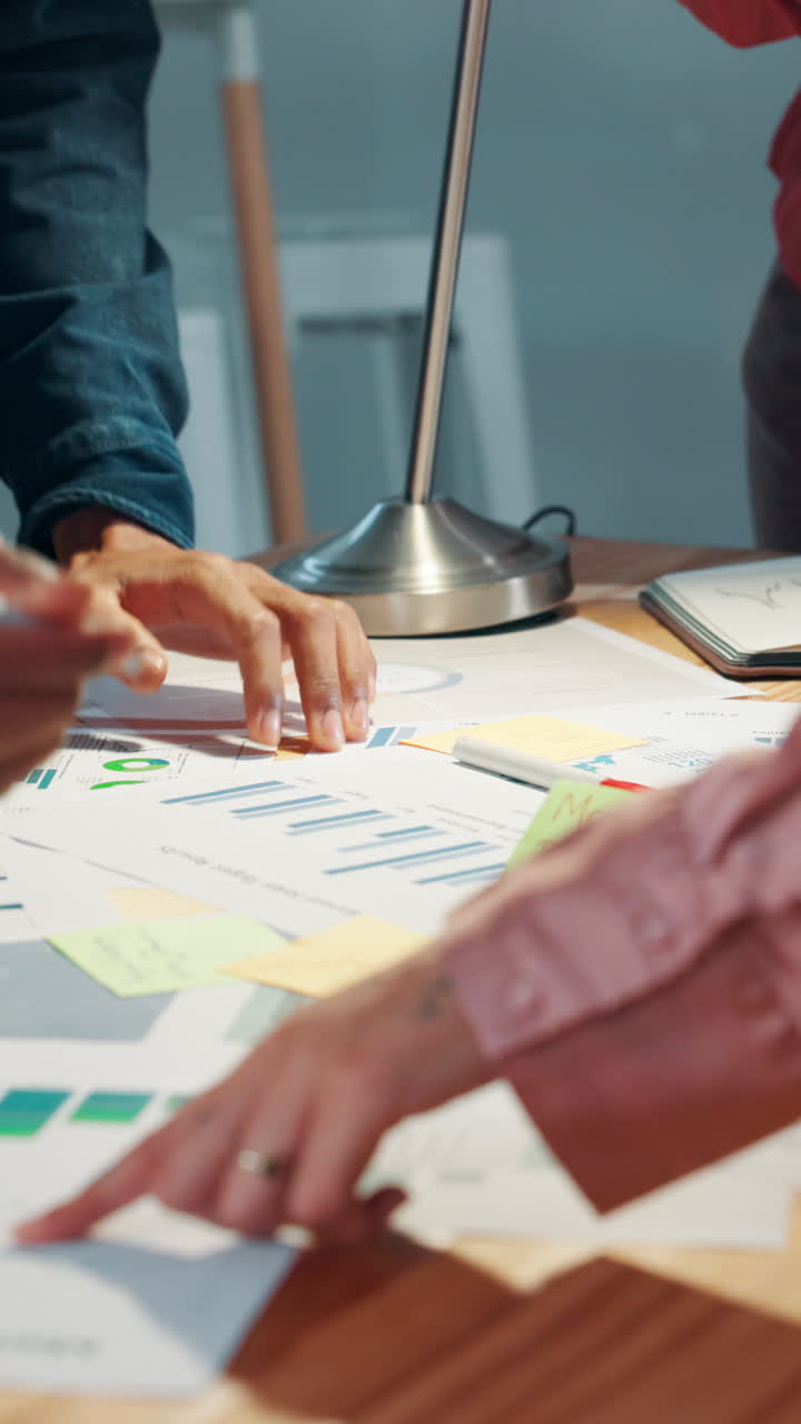 Business Team Analyzing Data and Planning Strategy in Office Meeting