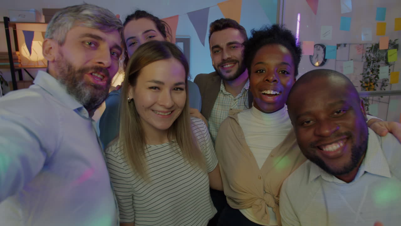 Happy Diverse Team Celebrating in Office