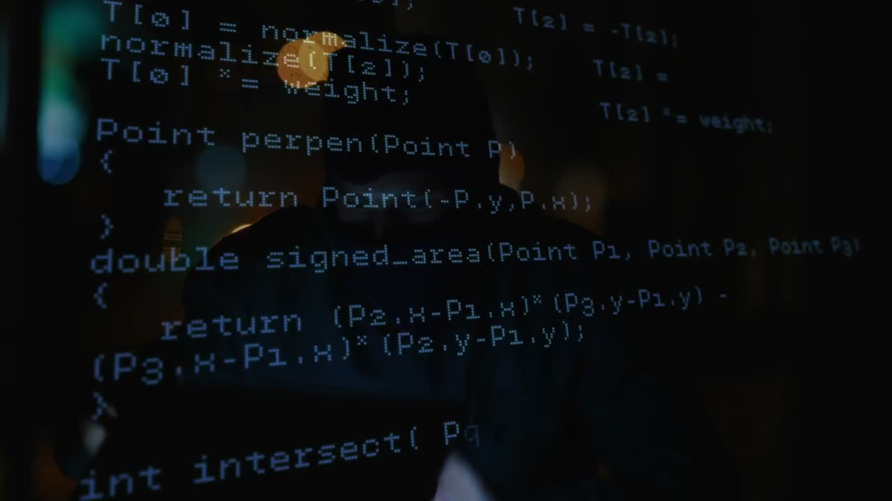 Animation of data processing over caucasian male computer hacker in balaclava using laptop