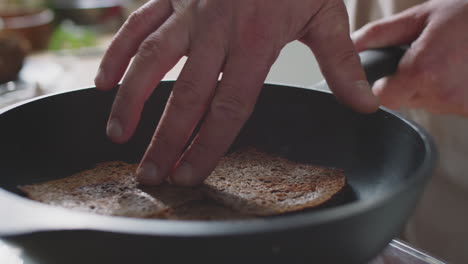 frying bread slices in a pan