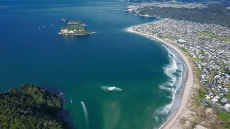 Panoramic-View-Over-Whangamata-Beach-With-Turquoise-Seascape-In-Coromandel,-New-Zealand---Drone-Shot