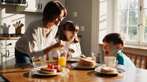family enjoying breakfast together at home