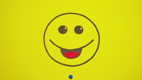 sonriente en fondo amarillo lleno de dulces de colores.