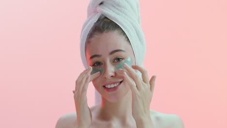 a young wearing wearing a towel on her head