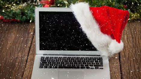 falling snow with christmas laptop