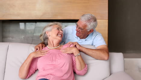 Senior-man-giving-his-partner-a-necklace