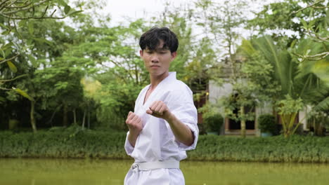 young man practising taekwondo