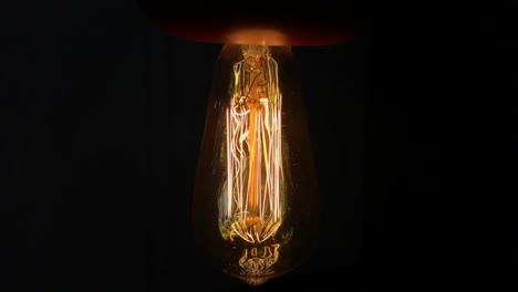 Light-bulb-in-the-dark-fluctuating