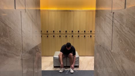 Wealthy-Asian-Millennial-Man-Undressing-in-Luxurious-Changing-Room