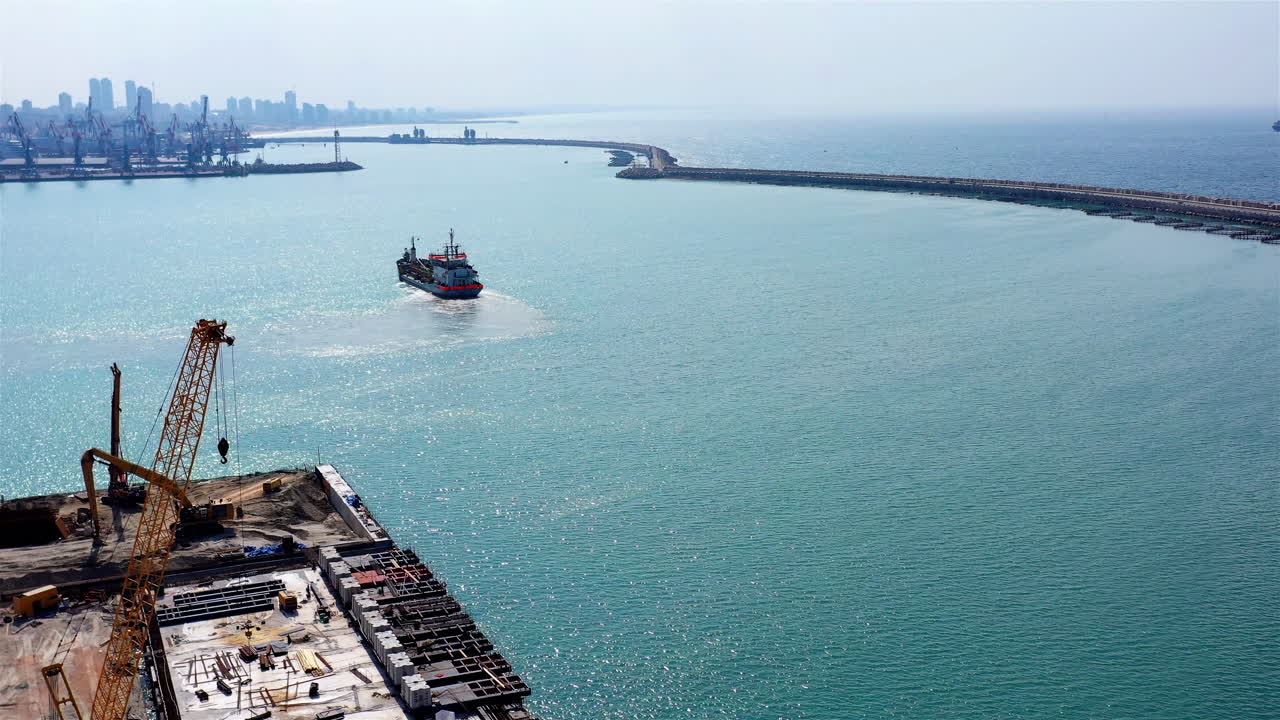 Suction Dredger vessel at Harbor in Mediterranean sea aerial footage