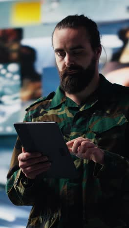 vertical video soldier operates in a virtual war zone using digital technology