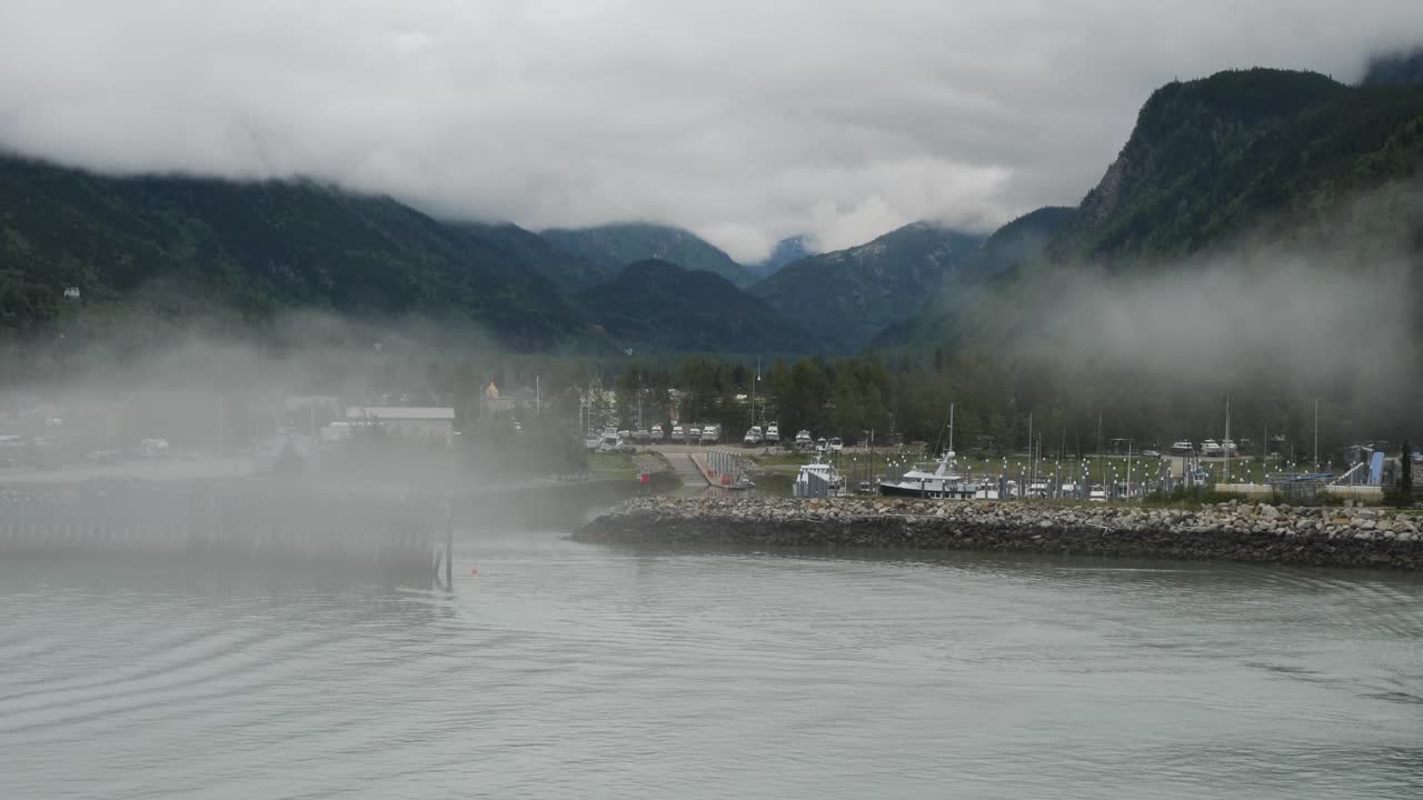 Heavy fog covering top of the mountains surrounding Skagway, Alaska