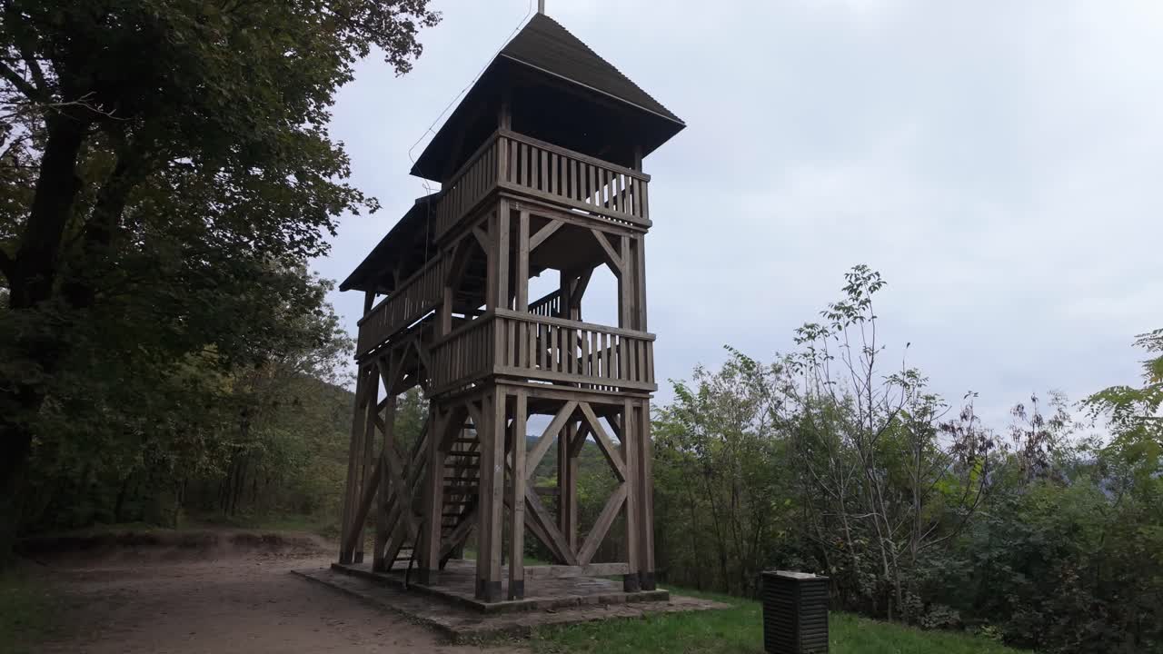 Wooden lookout tower on the hiking path in the forest near the bend of the Danube in Zebegeny, Hungary.