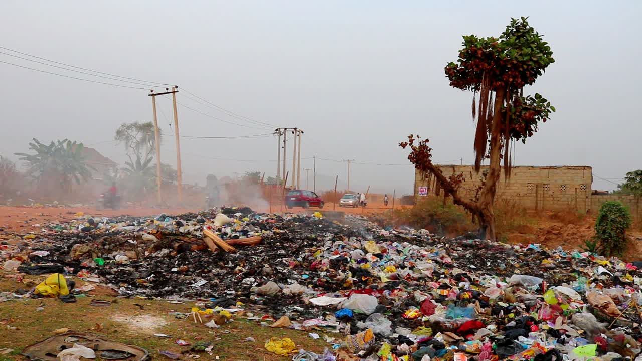 Burning refuse dump contamination of the environment.