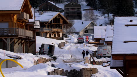 inside small mountain village in winter snow, idyllic ski resort in france
