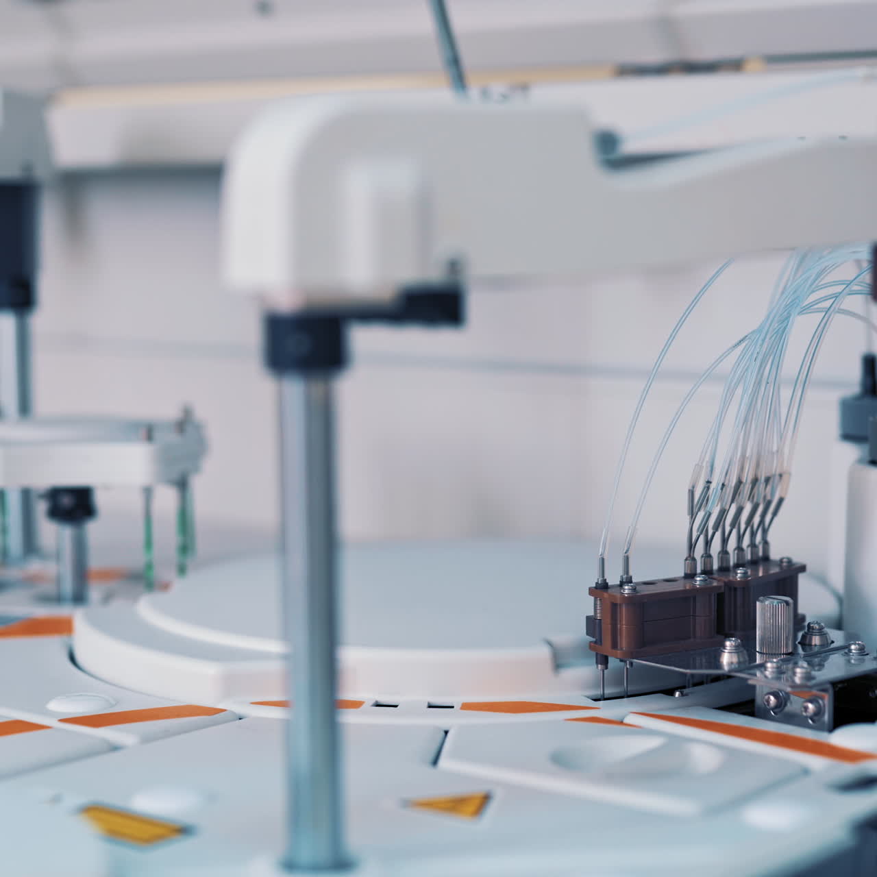 Modern medical equipment is working in the laboratory room at hospital. Work process of automated machine, blood and urine sample analysis in medical clinic.