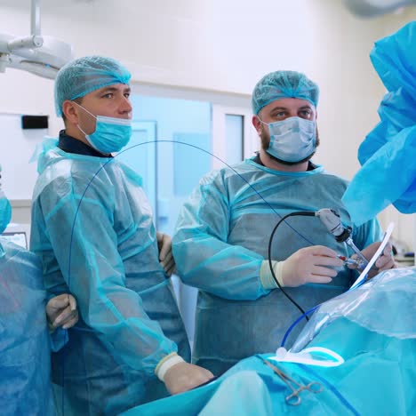 surgeon team at work in operating room