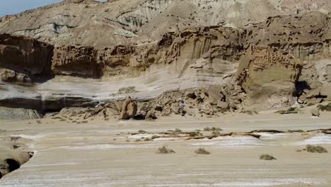 rock cliff in the beach coastal landform in persian gulf in iran natural landscape peaceful beach luxury resort camping ground and water sport marine adventure surfing diving in hormuz island seaside