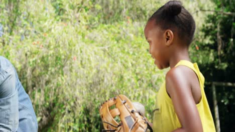 family playing baseball