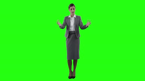 Mujer-De-Negocios-Gesticulando-En-Pantalla-Verde