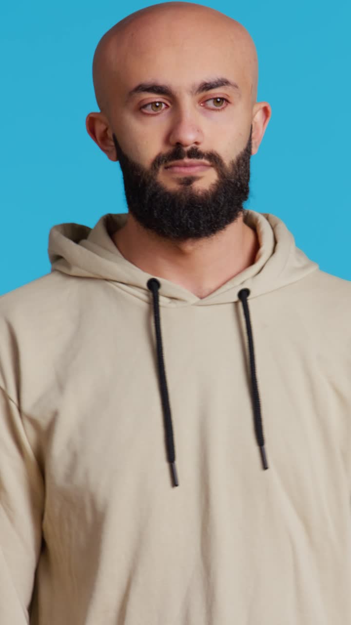 Vertical Video Middle eastern man acting casual on camera
